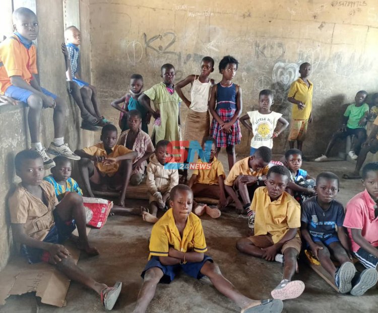 Pupils of Cherembo D/A sit on floor to take lessons