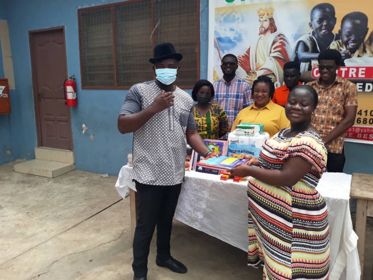 Ghana Association of Writers touch kids at the King Jesus Charity home with a reading clinic, and donated learning materials