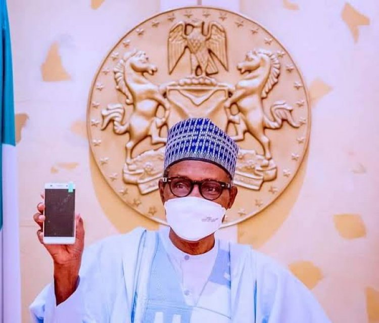President Buhari Receives First Made-In-Nigeria Phone