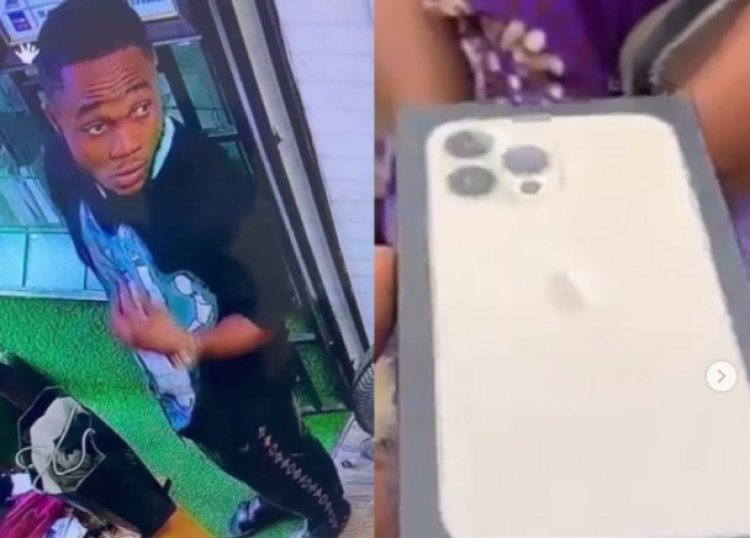The mother of a 'big boy' who was caught on camera stealing an iPhone 13 returns it to the shop owner