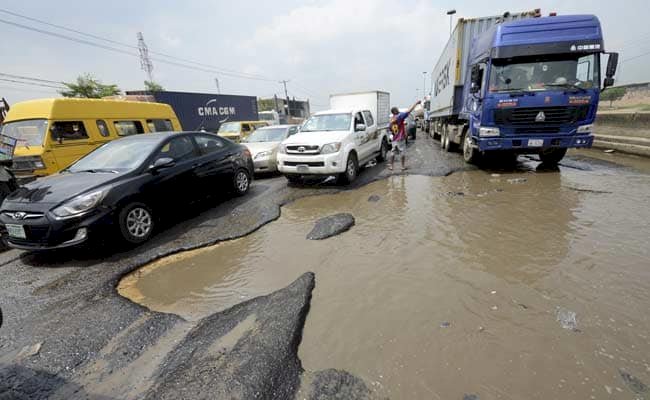 "Travel By Road And Tell Us If The Roads Are Good, Nigerians challenge Fashola