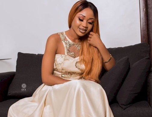 Akuapem Poloo takes down horrendous photo after being accused of child abuse.