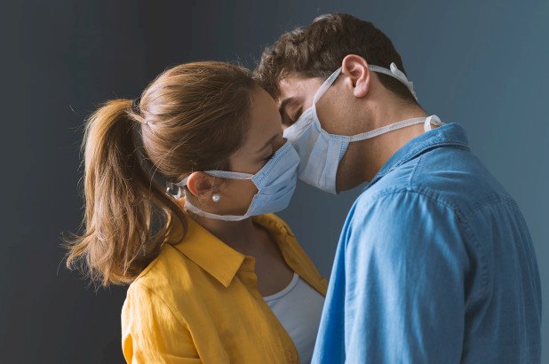 Couples should wear face masks during sex, new study insists